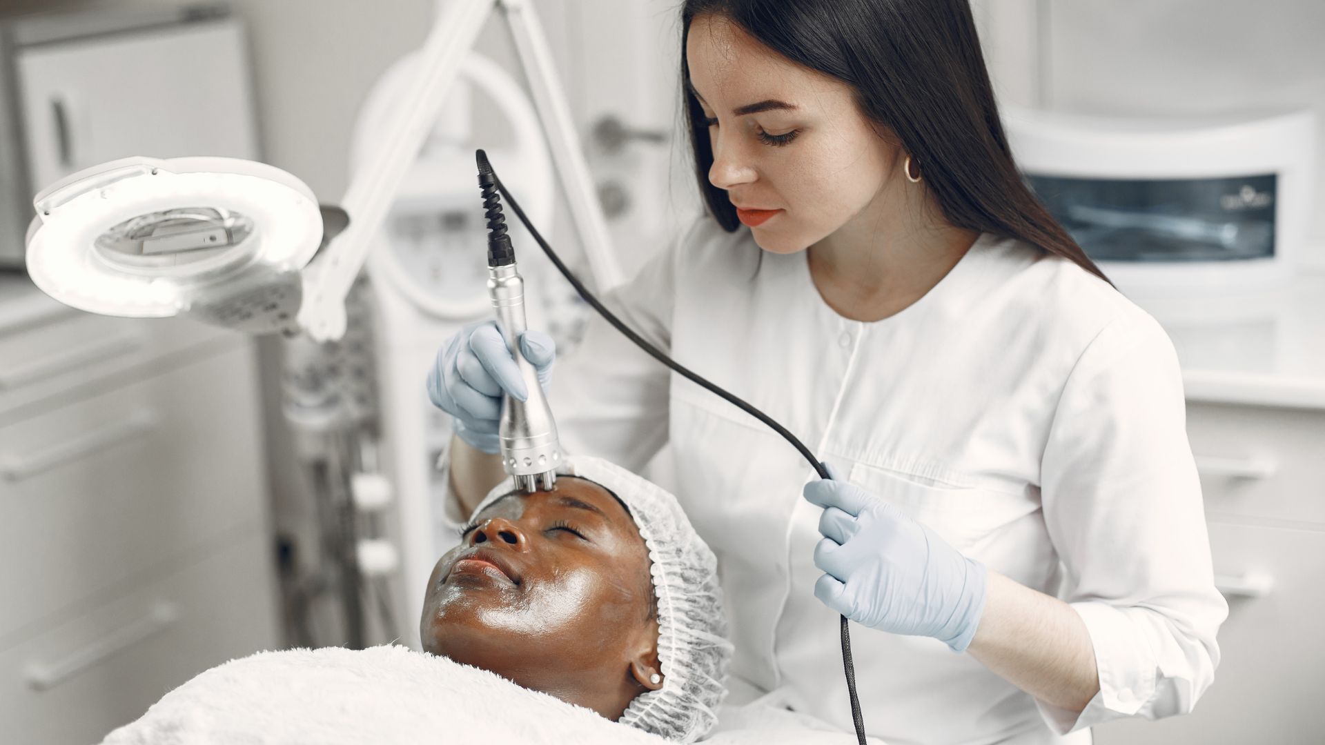 Can a dermatologist remove skin lesions?